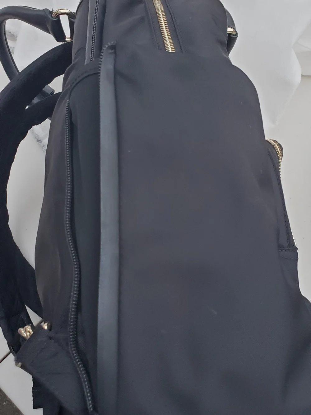 Lo & Sons Black Backpack with Gold Zipper Accents